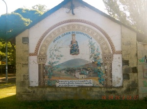 Mural on the side of the Ermita Santa María in Compostilla